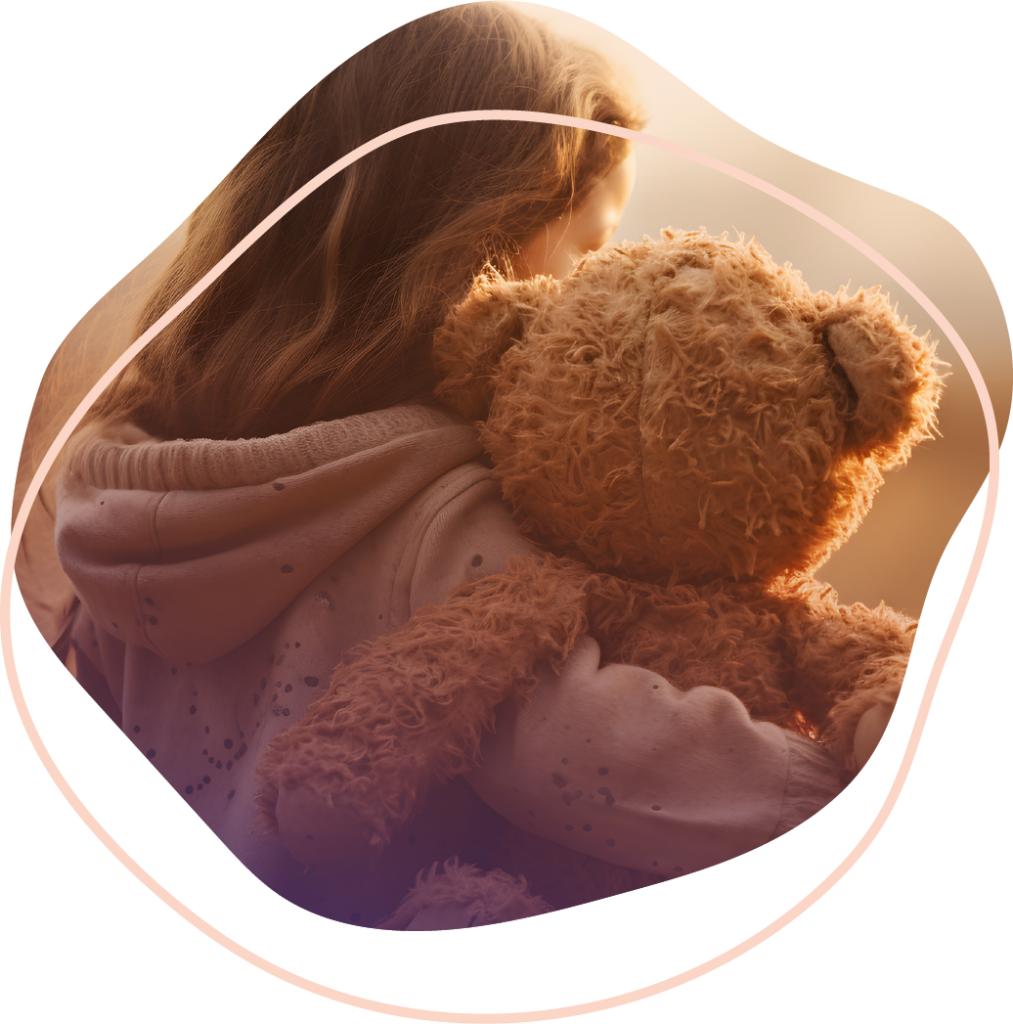 Child holding a teddy bear