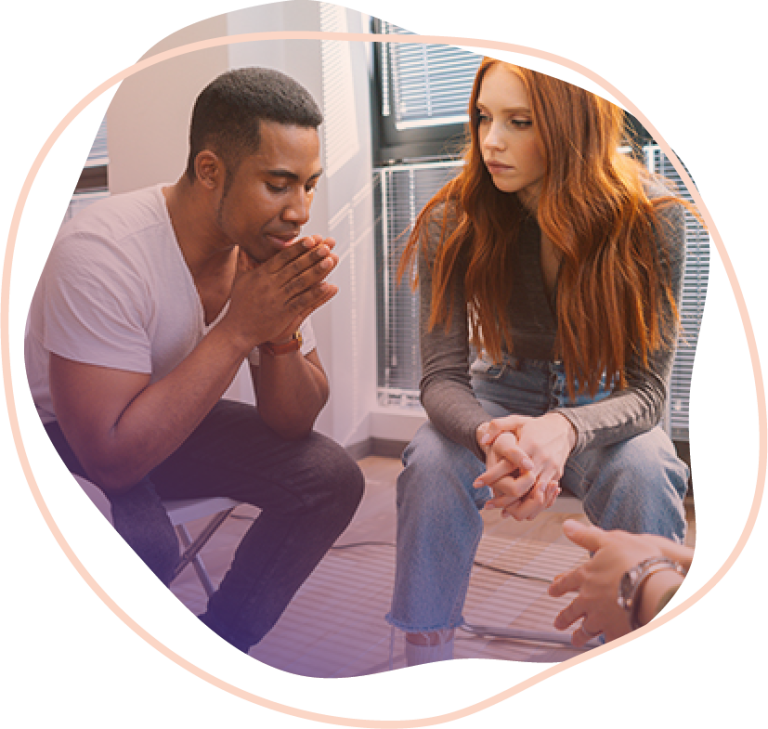 A group of young adults together at a support program