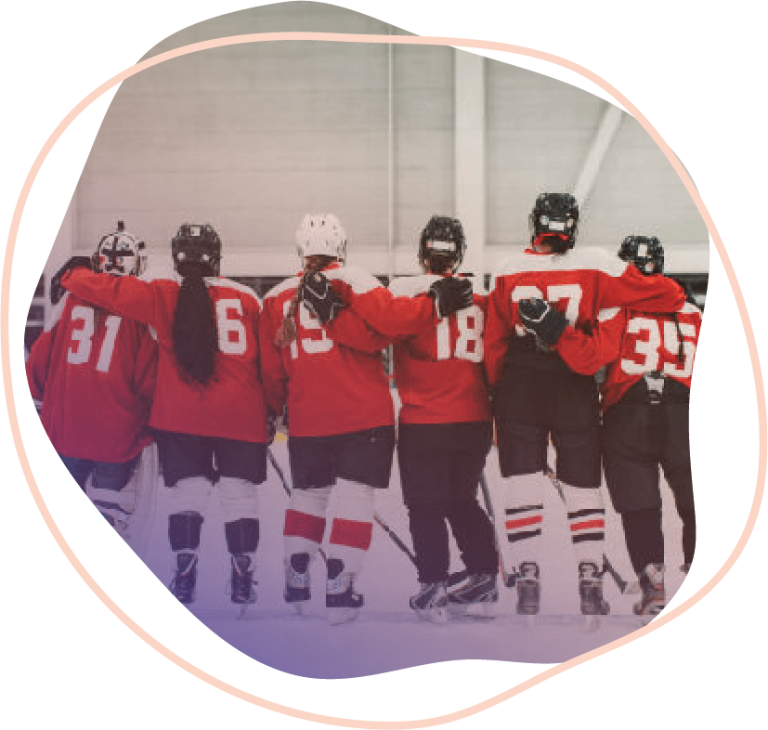 A group of hockey players with their arms around each others shoulder