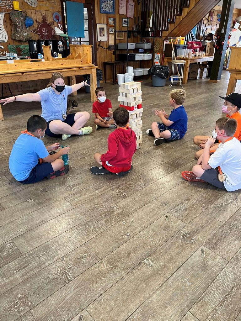 Children playing with a tumbling tower
